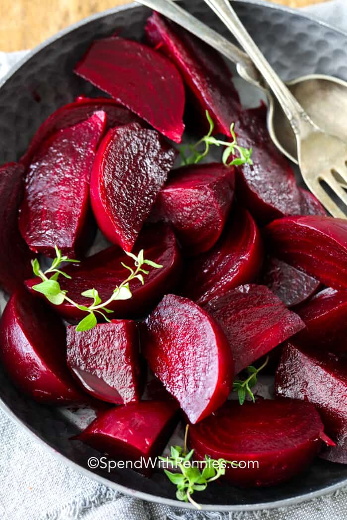 Sliced cooked beets in a bowl. 