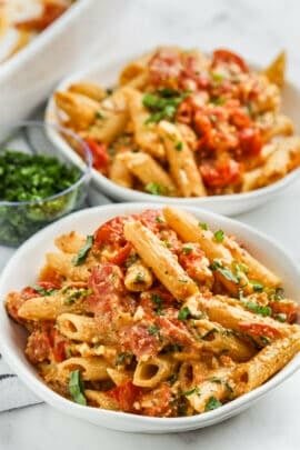 close up of Baked Feta Pasta in two bowls