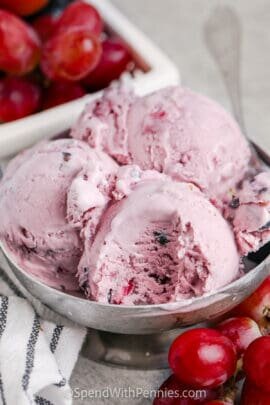 close up of No Churn Grape Ice Cream with a bite taken out