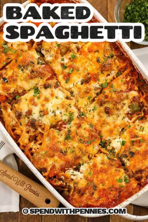 cheesy Baked Spaghetti in the casserole dish with a title